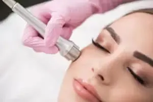 close up image of a woman undergoing a facial rejuvenation treatment