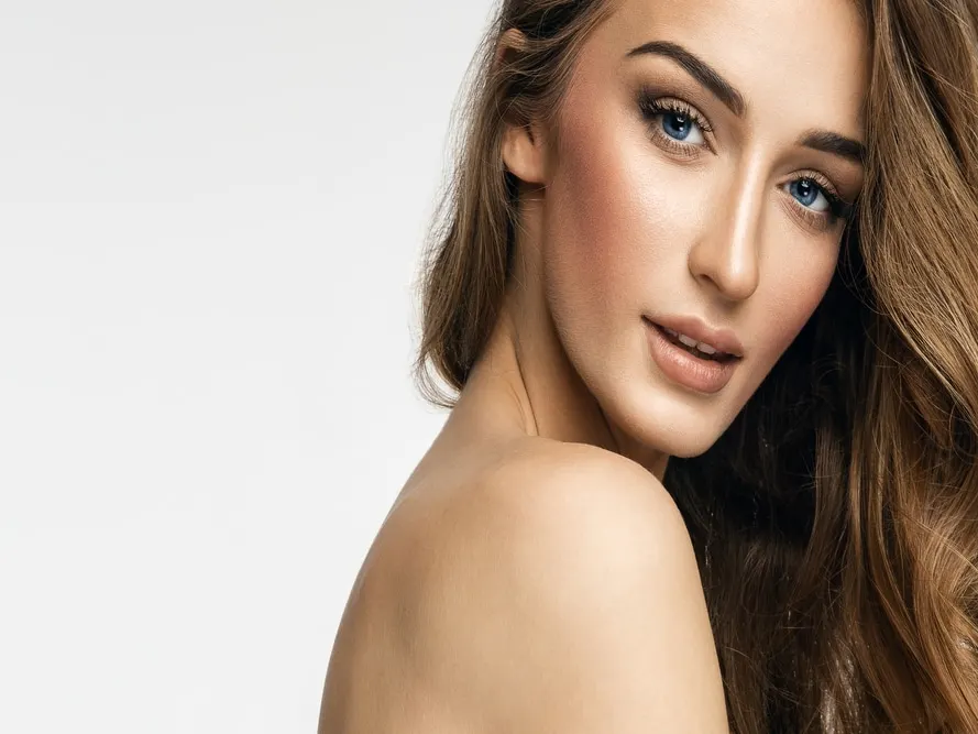 Woman with bright complexion after HydraFacial in Miami, FL