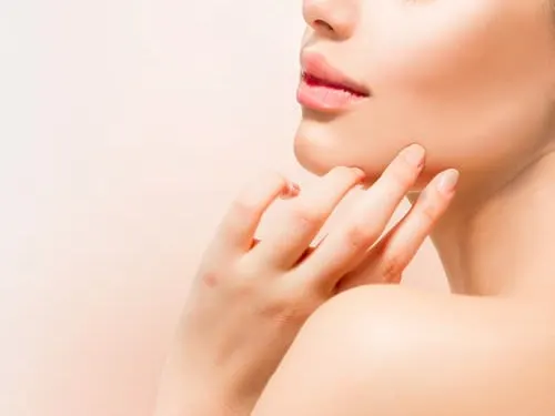 Woman with smooth facial appearance after laser treatment in Miami Beach, FL