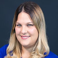 Ivette Castro, Referral & Authorization Coordinator, smiling, with long blonde hair and a blue top