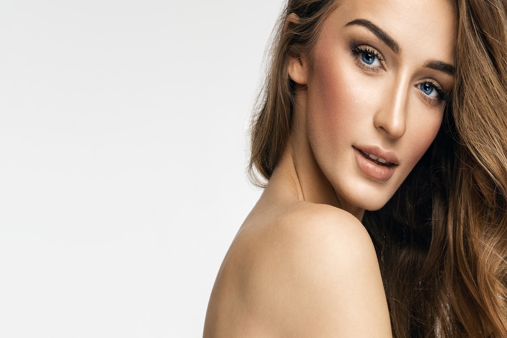 Woman with bright complexion after HydraFacial in Miami, FL