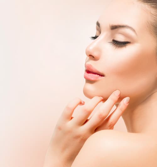 Woman with smooth facial appearance after laser treatment in Miami Beach, FL